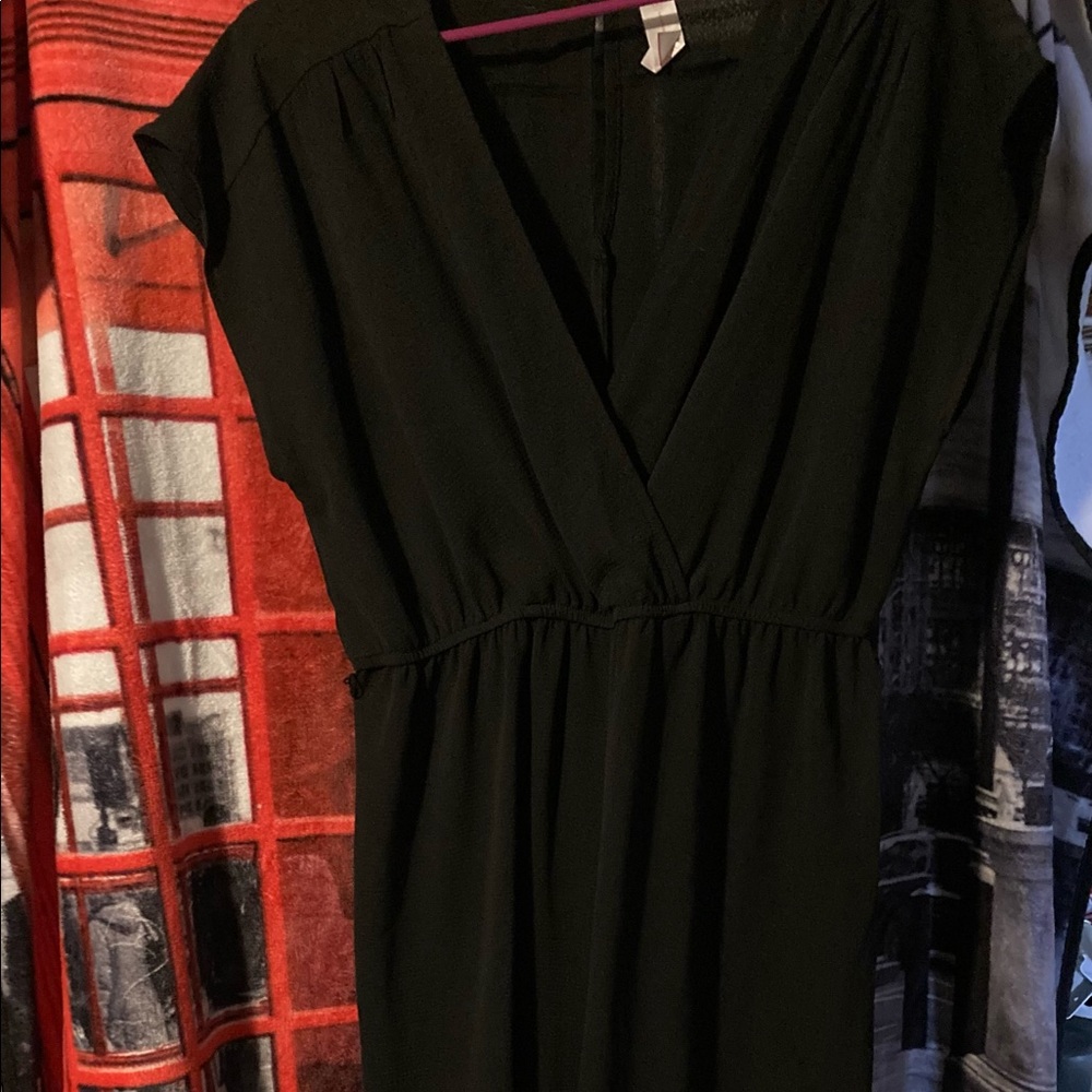 Black, ankle length romper.